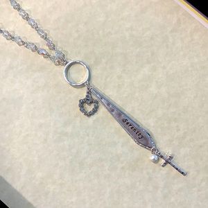 28” Worn Silvertone “Serenity” Spoon Handle & Cross Pendant Necklace